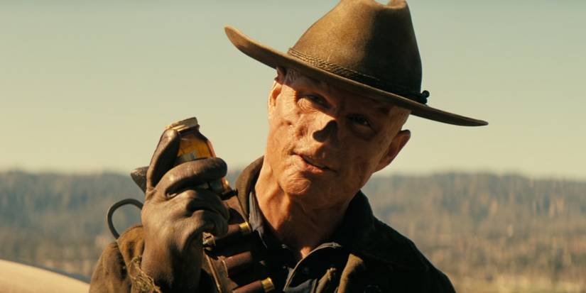 The Ghoul (Walton Goggins) holding a bottle of Buffout in 'Fallout'