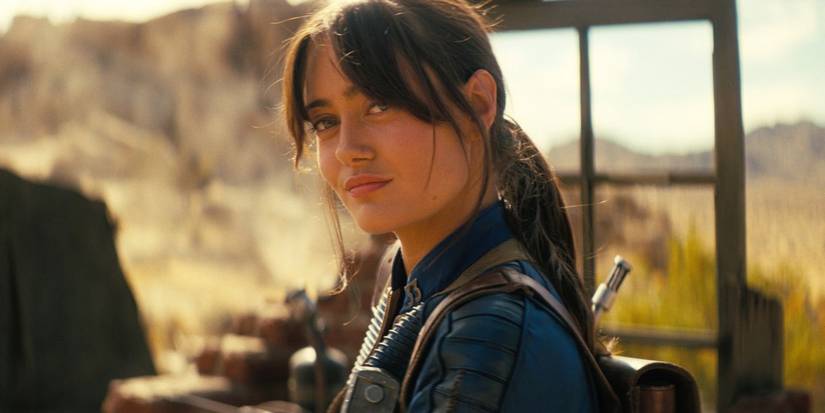 Lucy with a small smile