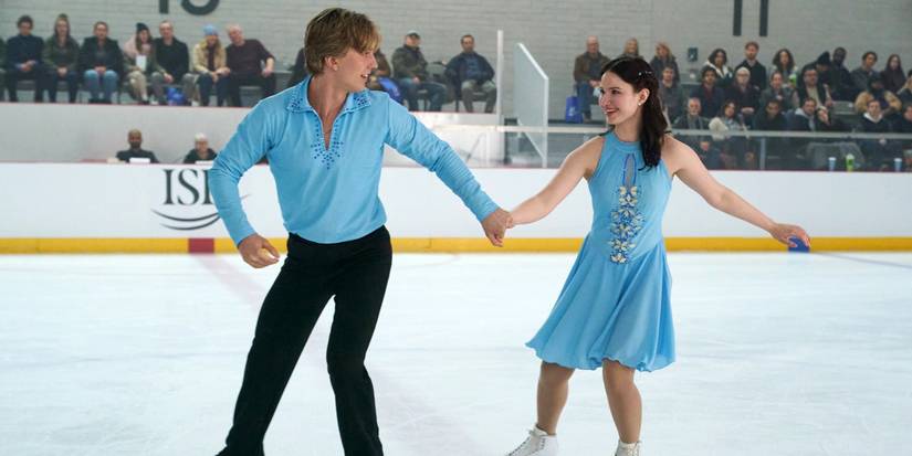 Cale Ambrozic as Brayden ice skating in costume with Madeyln Keys as Adriana in Finding Her Edge