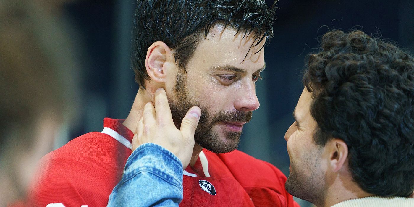 François Arnaud's Scott Hunter smiling and looking into a man's eyes on the ice in Heated Rivalry
