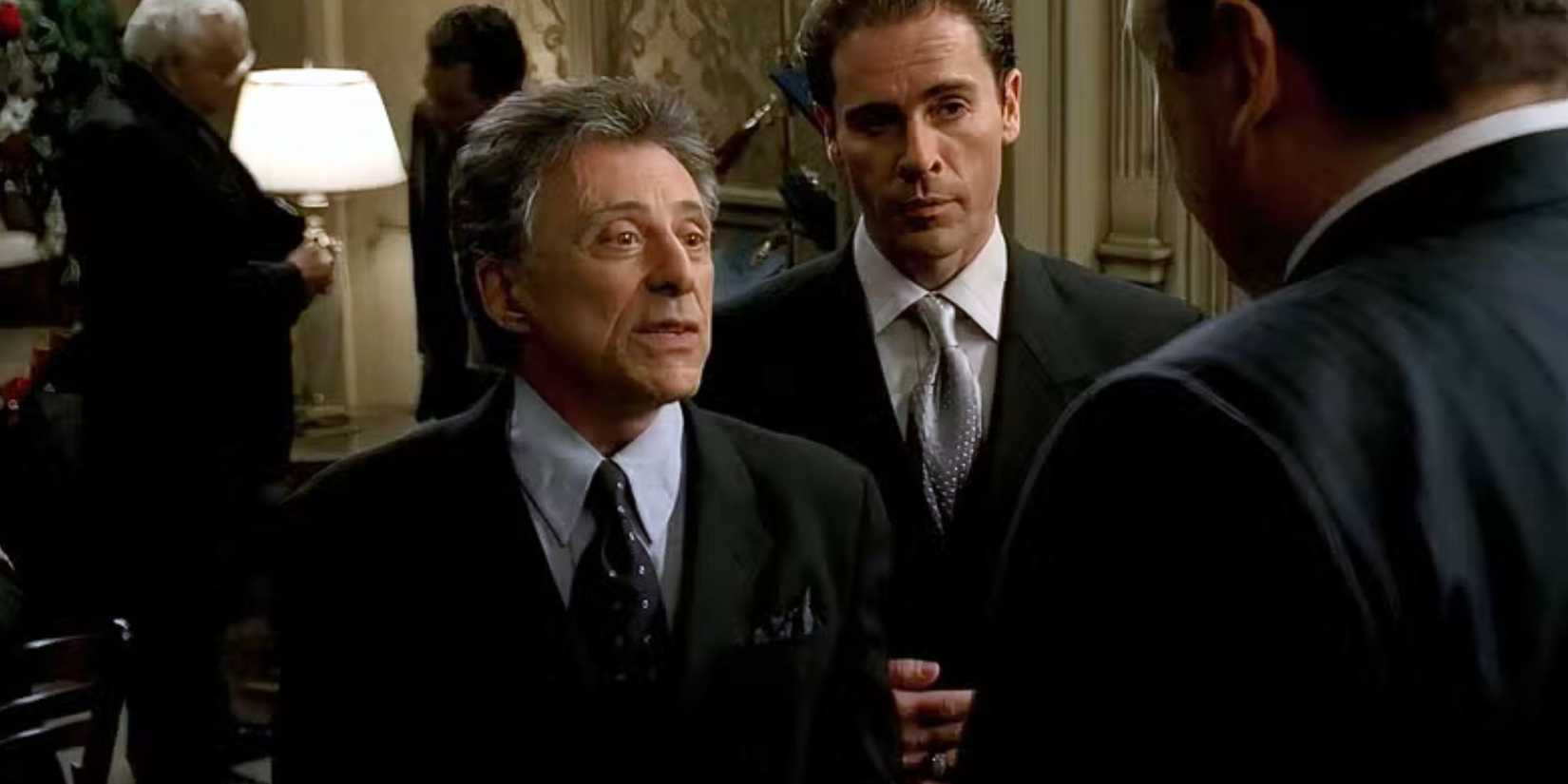 Frankie Valli as Rusty Millio talking to a man standing in front of him while another man is standing next to him in The Sopranos