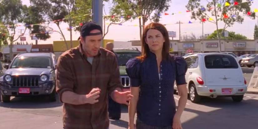 Luke and Lorelai car shopping in 'Gilmore Girls' Season 7.