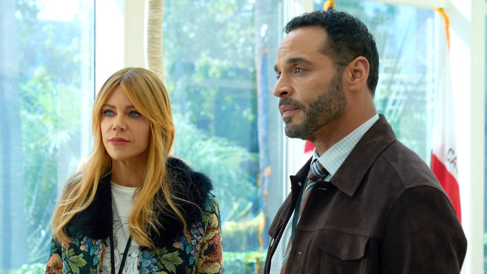 Morgan Gillory and Adam Karadec standing together at the FBI in High Potential Season 2 Episode 9