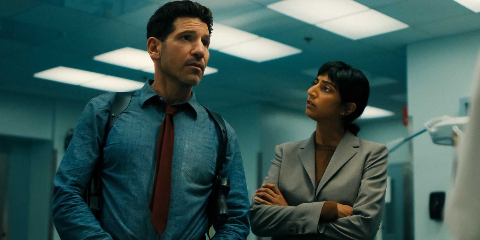 Jon Bernthal's Jack and Sunita Mani's Priya standing together in His & Hers