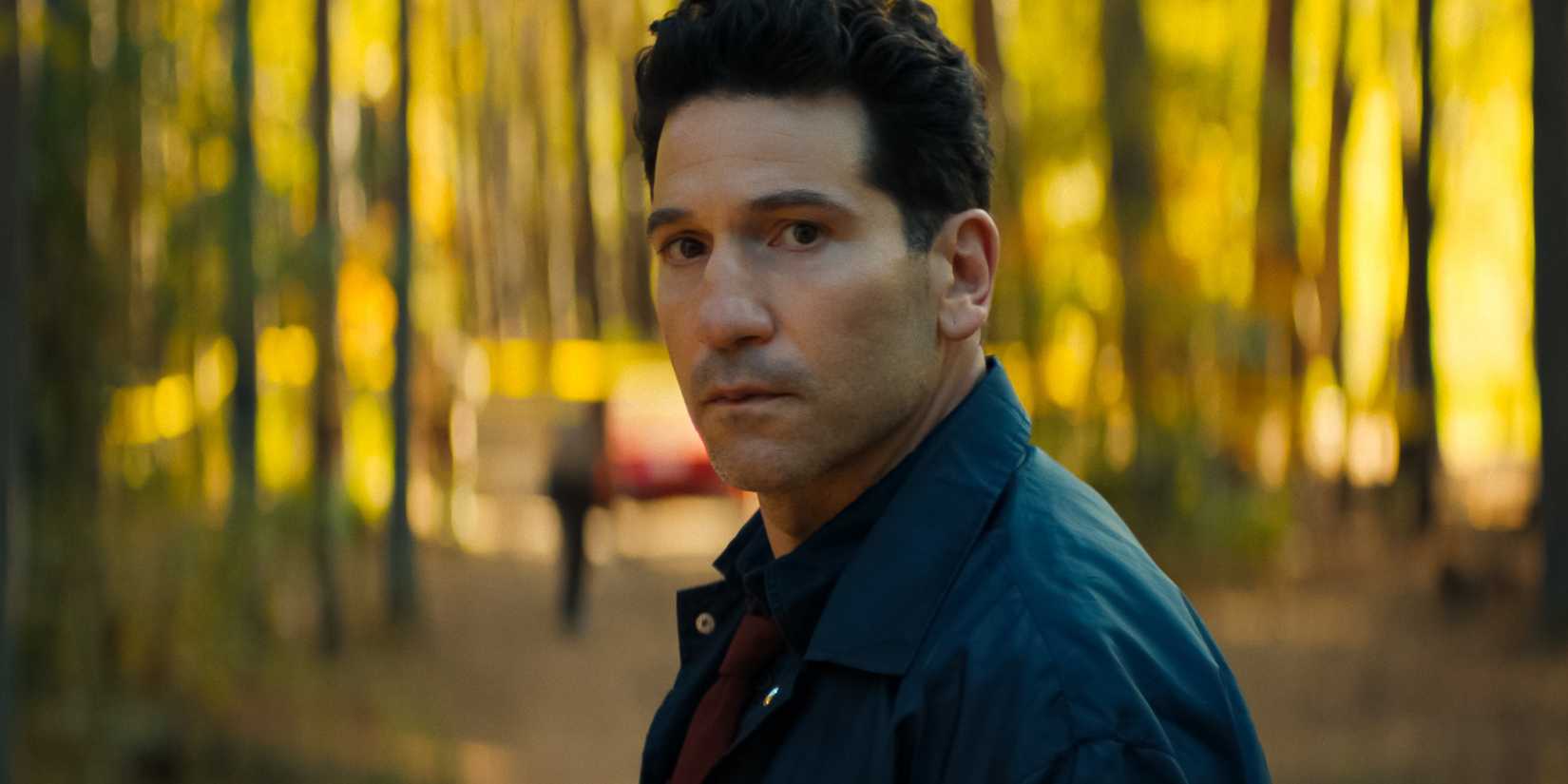 Jon Bernthal's Jack looking panicked in the woods in His & Hers