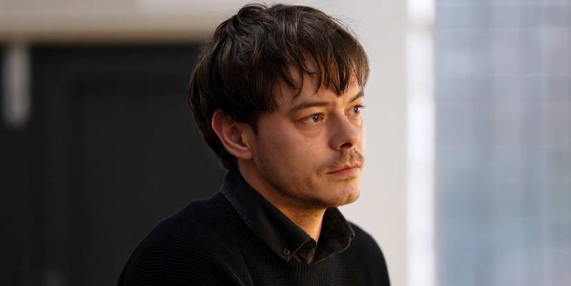 Charlie Heaton as James Dycker looking off in contemplation in Industry Season 4