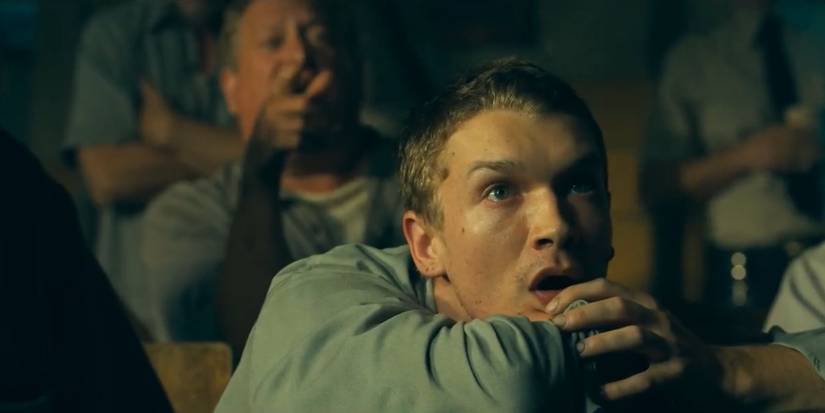 Connor Storrie looking ahead intently in Joker: Folie a Deux