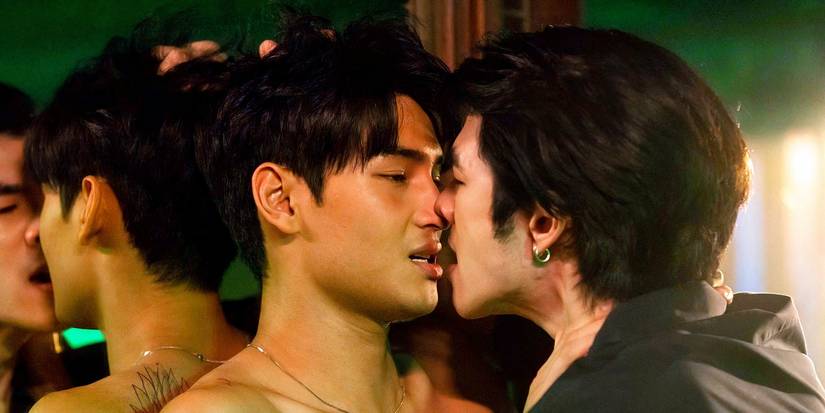 KinnPorsche's male leads having an intense moment and about to kiss.