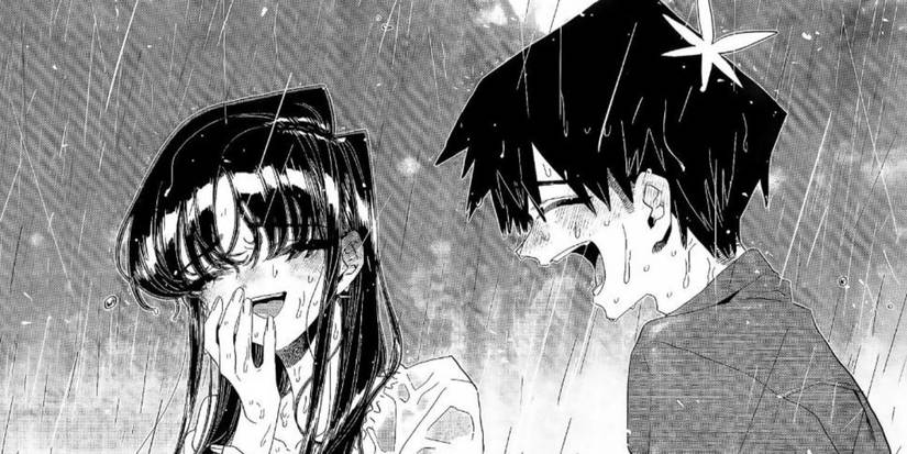 A boy and a girl laughing in the rain in Komi Can't Communicate manga