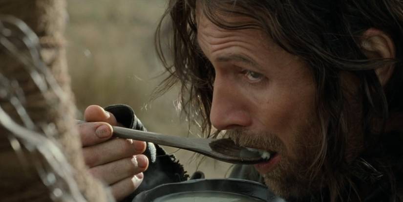 Aragorn (Viggo Mortensen) eats bad stew in 'The Lord of the Rings: The Two Towers'