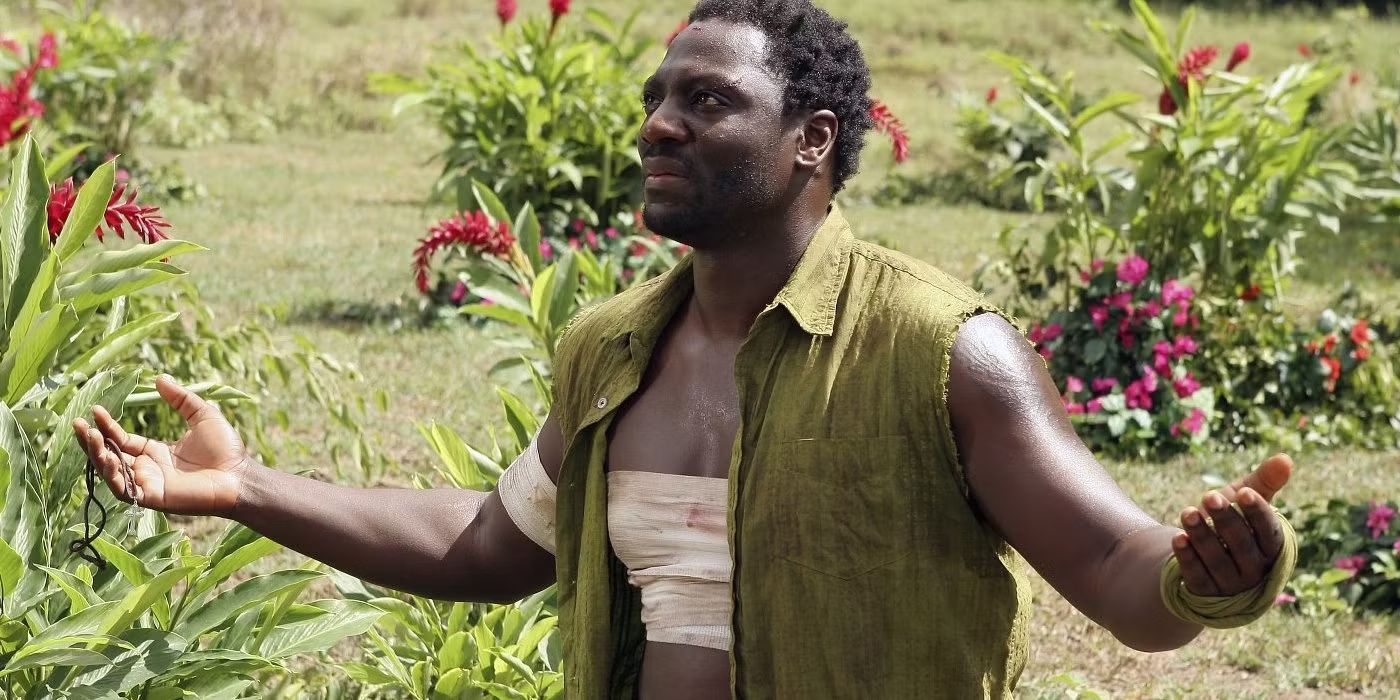 Adewale Akinnuoye-Agbaje as Mr. Eko in Lost with his arms outstretched and a bandage around his chest