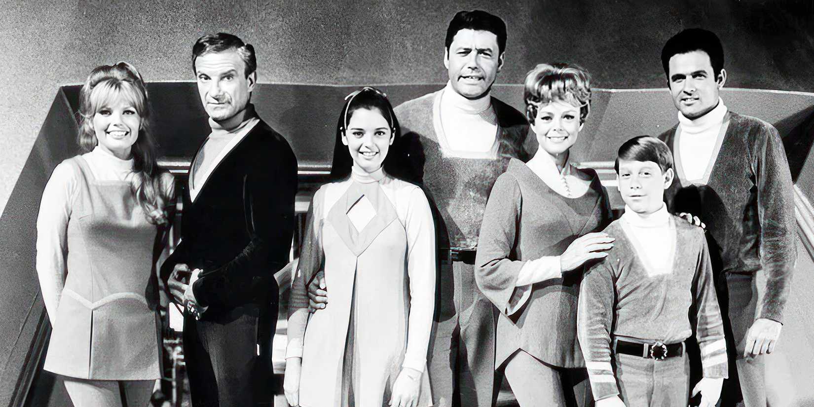 A black and white image of the cast of the original Lost in Space.