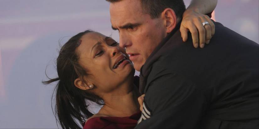 Matt Dillon holds a tearful Thandiwe Newton in Crash.