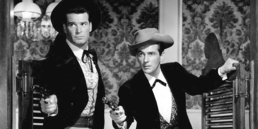 James Garner as Bret Maverick and Jack Kelly as Bart Maverick together with firearms on 'Maverick'