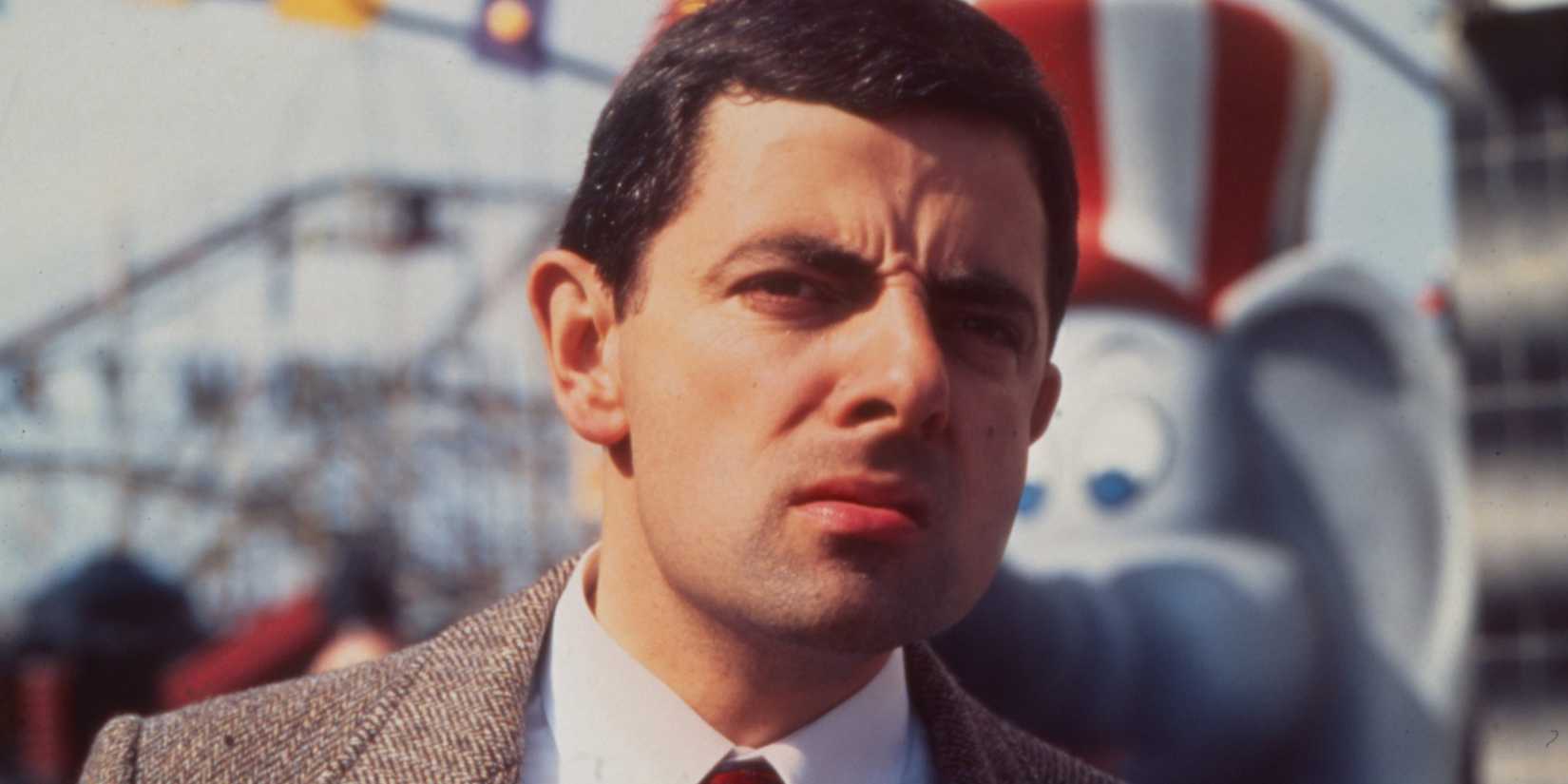 Rowan Atkinson frowning as Mr. Bean