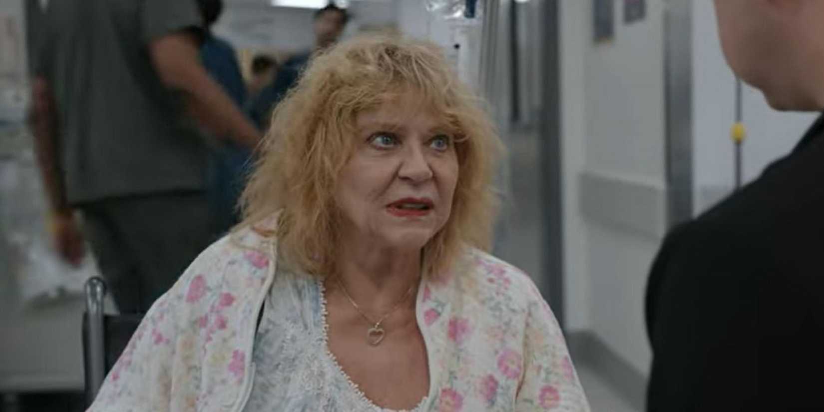 Jeanette O'Connor as Myrna talking to someone in The Pitt.