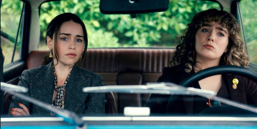  (l-r) Emilia Clarke as Bea, Haley Lu Richardson as Twila in a car in Ponies.