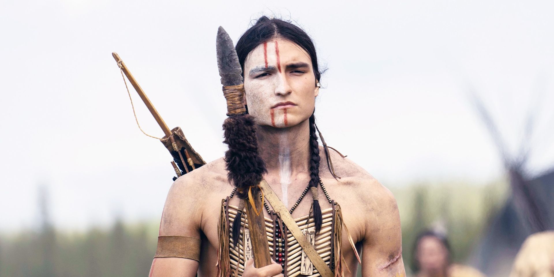 Dakota Beavers as Taabe looking at the horizon in Prey.