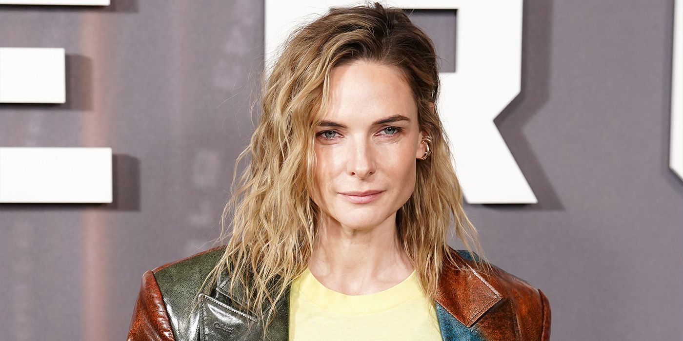 Rebecca Ferguson smiling on the red carpet