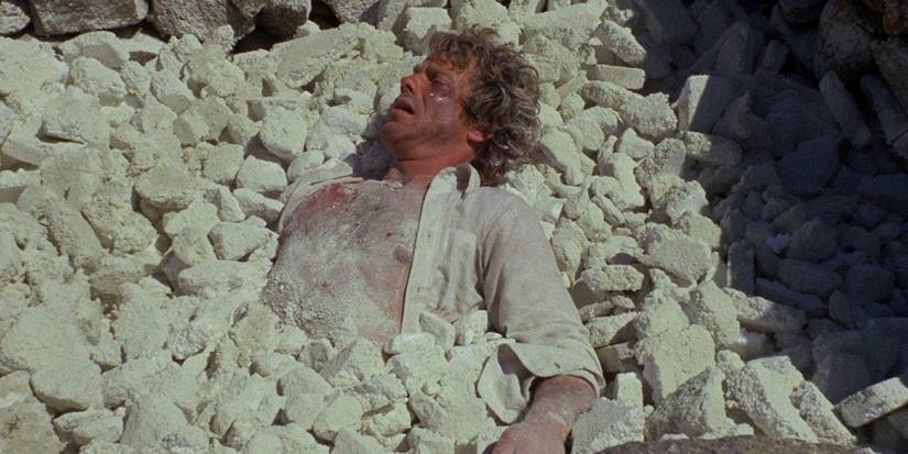 Robert Behling buried in ruble in 'Island of Death' (1976)