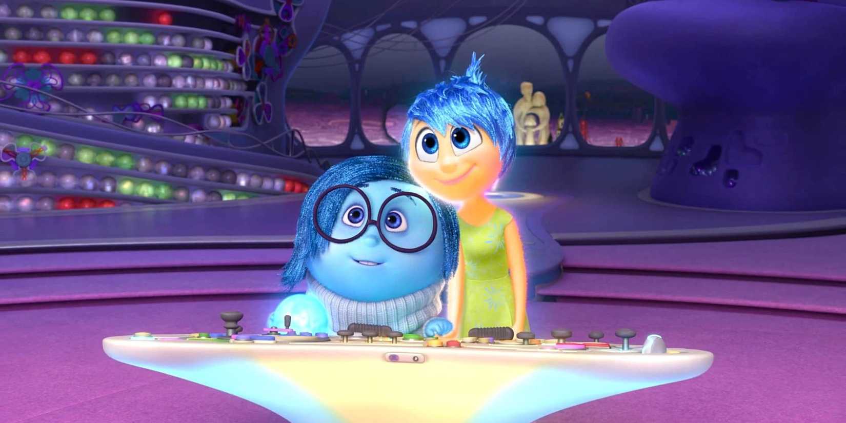 Sadness and Joy smiling at the console in 'Inside Out'