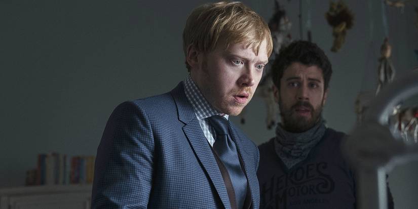 Rupert Grint's Julian looking on, horrified in Servant