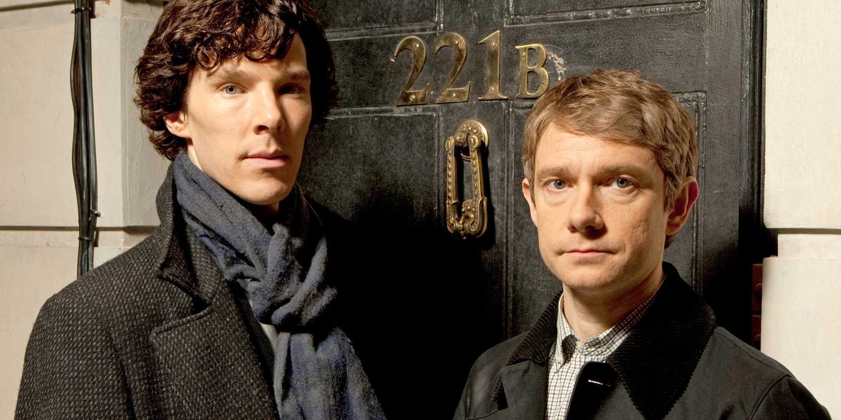 Benedict Cumberbatch and Martin Freeman in front of 221B Baker Street in Sherlock