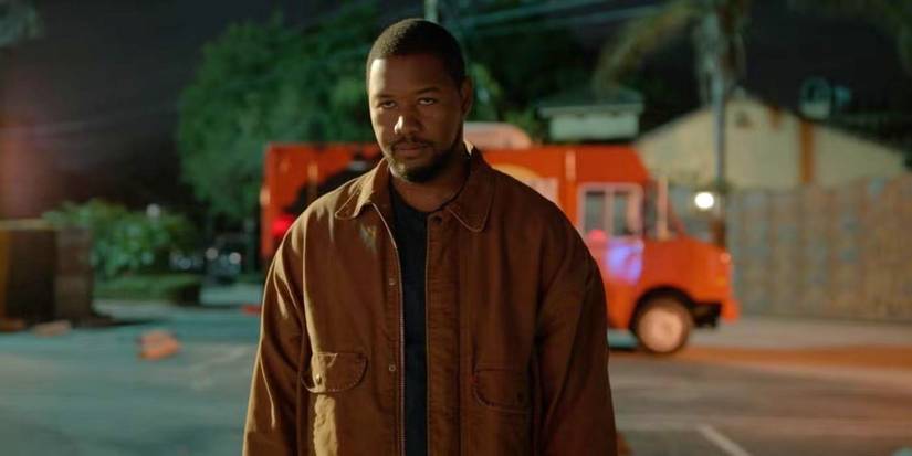 Sean (Luke Tennie) looking angry in the dark in Season 2 of 'Shrinking'.