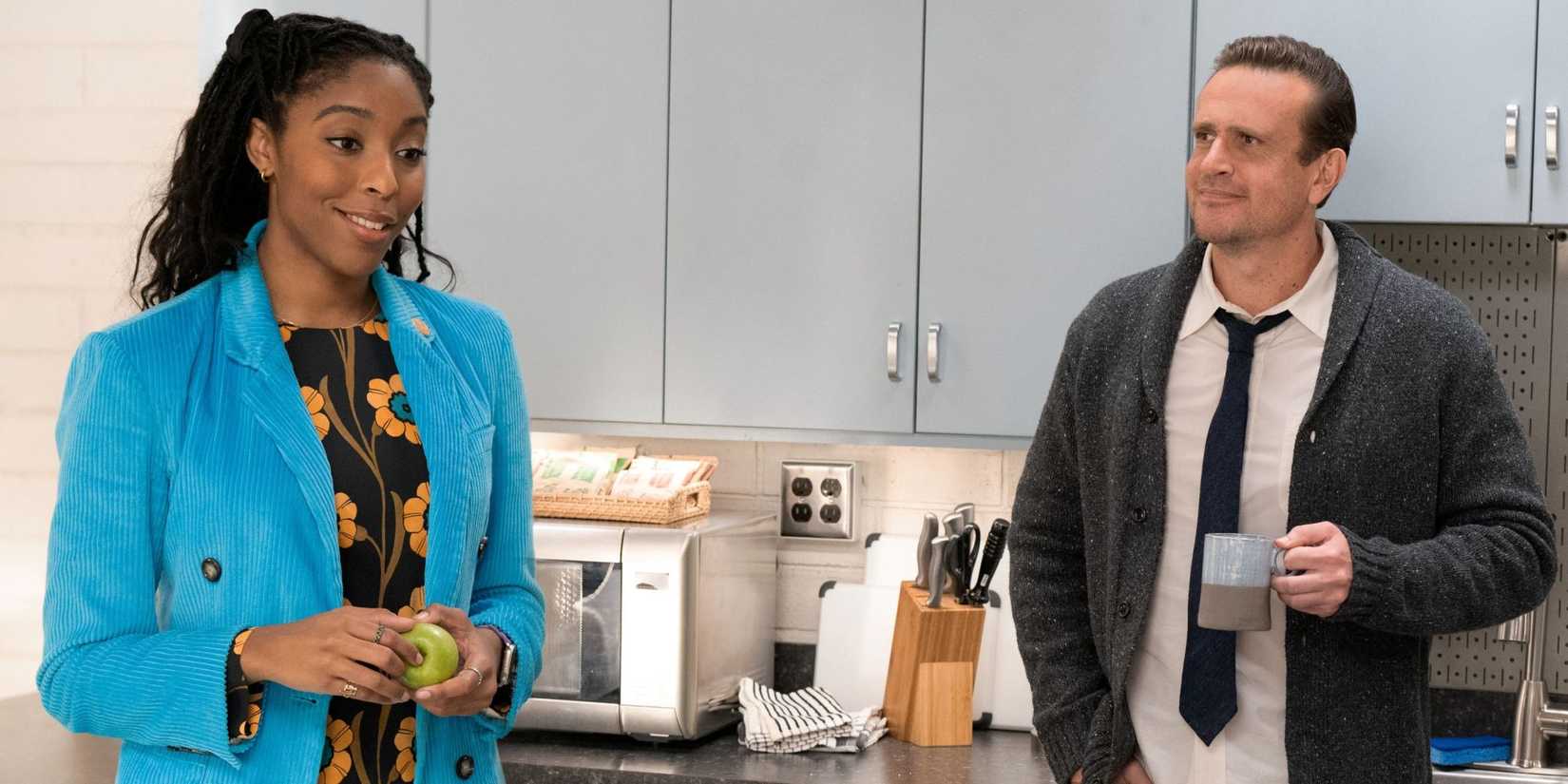 Jessica Williams as Gaby standing in the break room with Jason Segel as Jimmy in Season 2 of Shrinking.