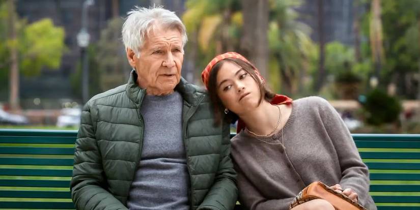 Paul (Harrison Ford) and Alice (Lukita Maxwell) sitting on a bench in 'Shrinking' Season 3.