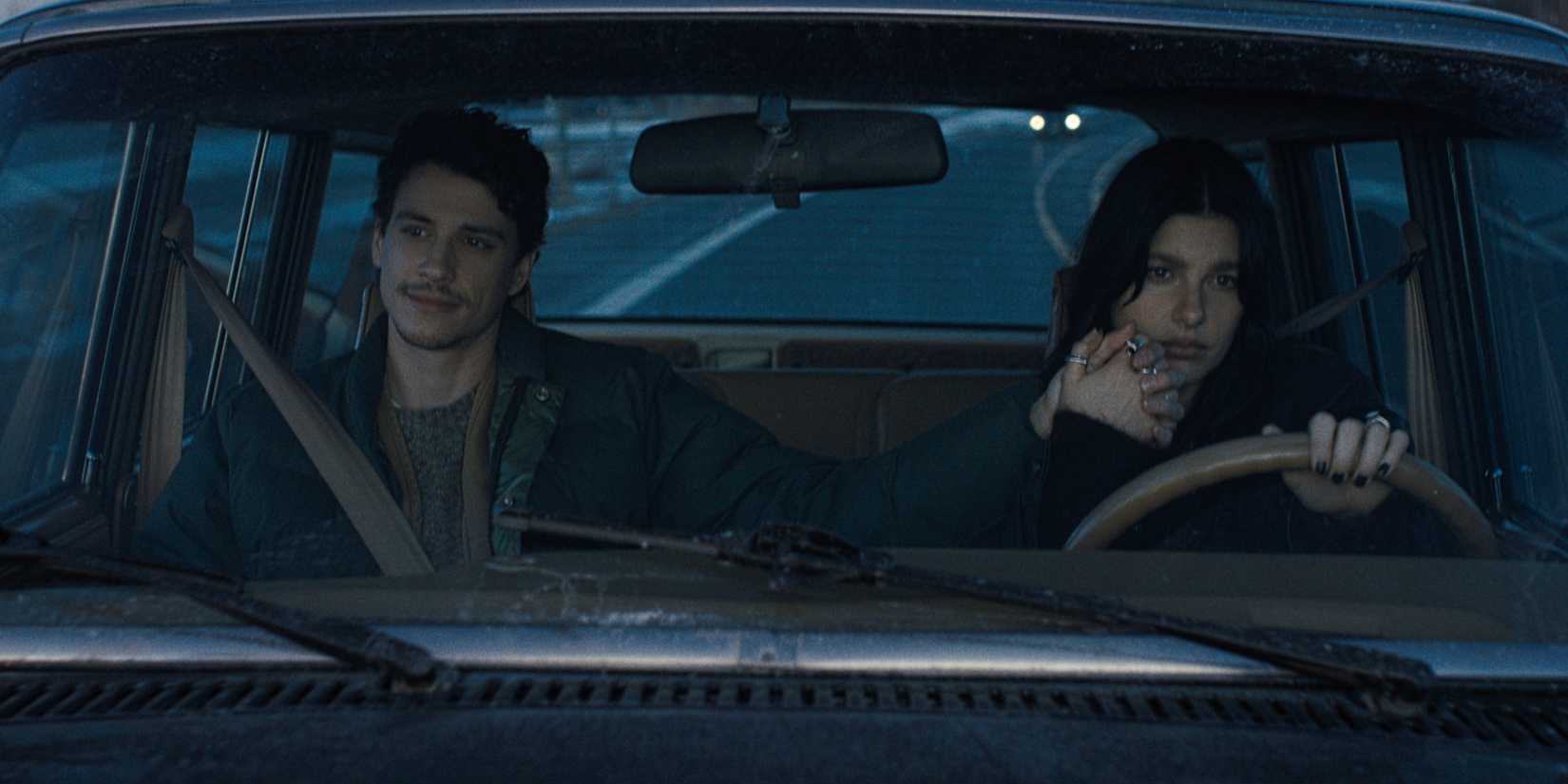 Adam DiMarco and Camila Morrone drive in Something Very Bad Is Going to Happen.