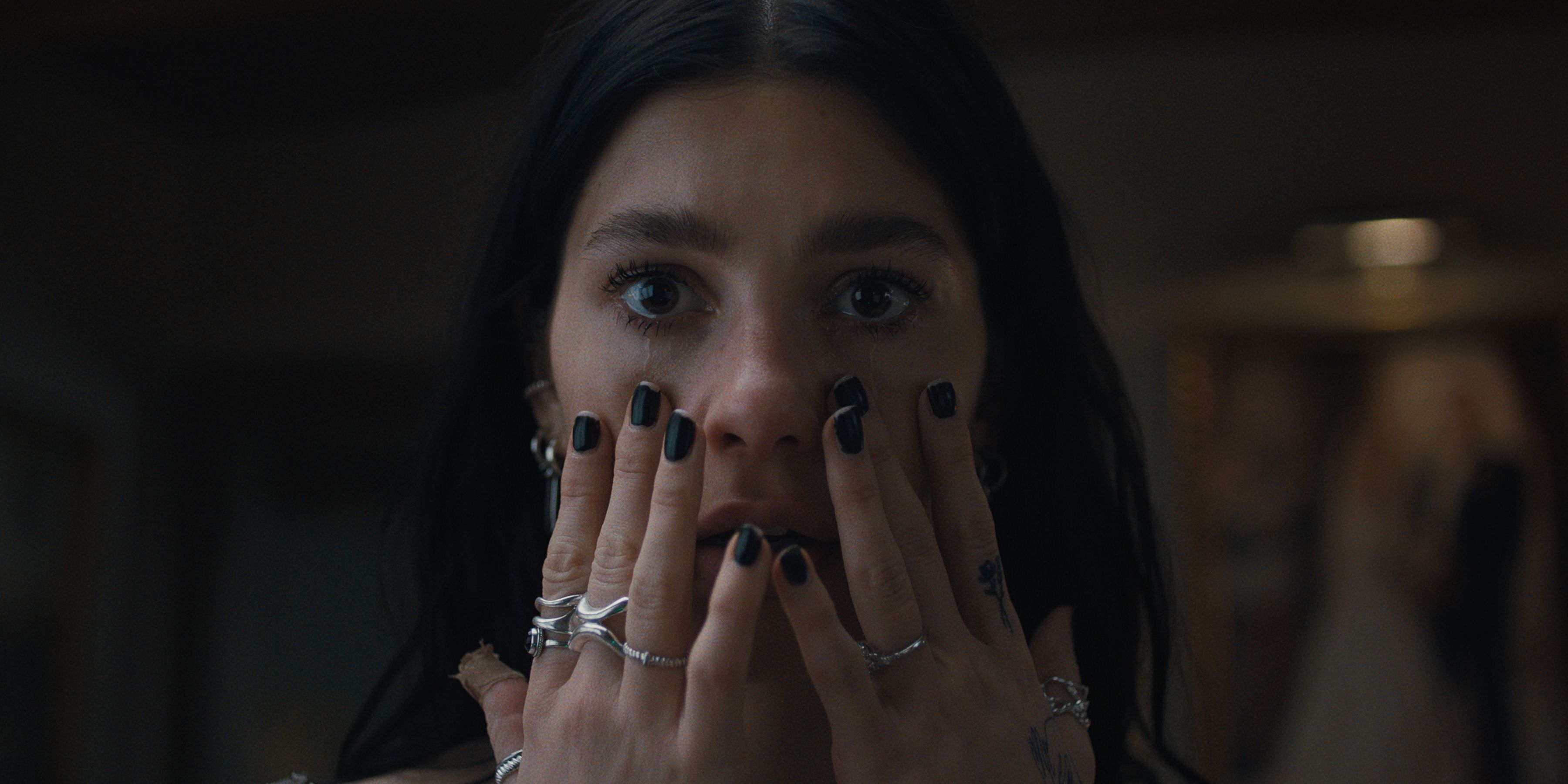 Camila Morrone is horrified in Something Very Bad Is About to Happen.