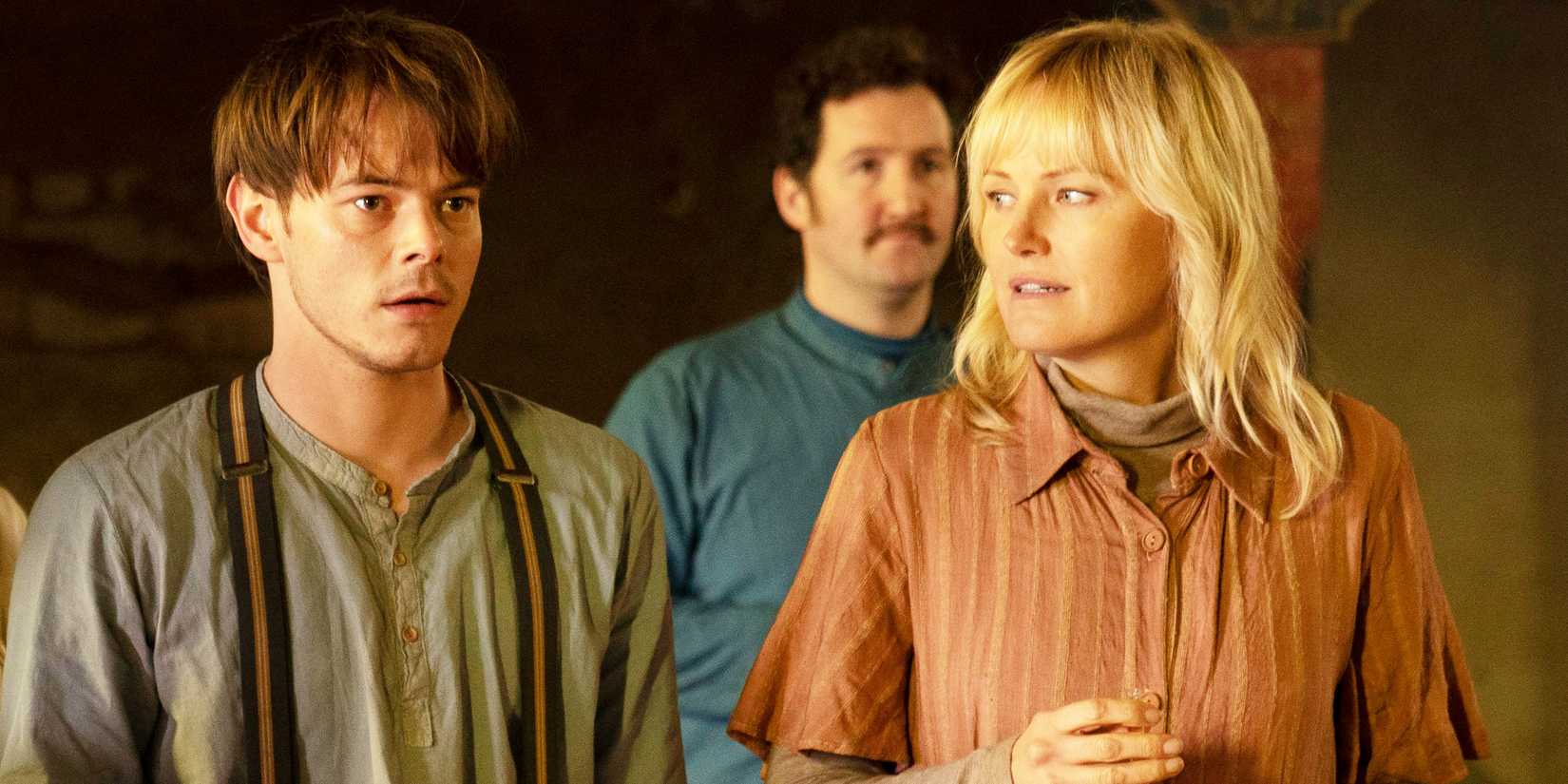 Charlie Heaton's Kurt standing with Malin Ackerman's Martha in Soulmates