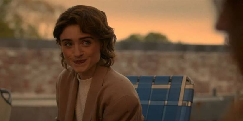Nancy Wheeler (Natalia Dyer) sitting on the roof in the 'Stranger Things' Season 5 finale.