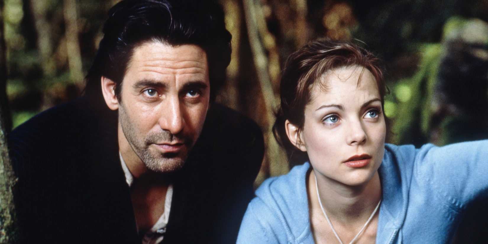 Scott Cohen's Wolf standing with Kimberly Williams-Paisley's Virginia in The 10th Kingdom