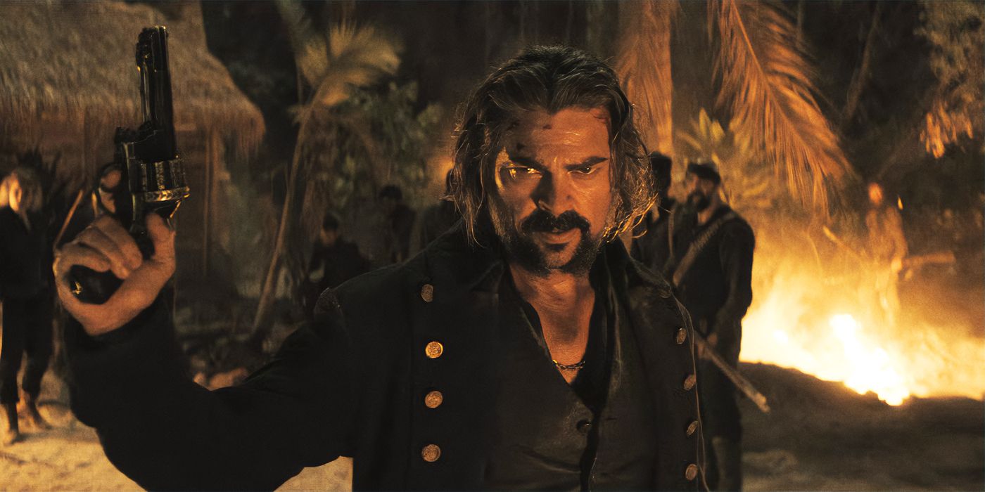 Karl Urban holding up a revolver in The Bluff