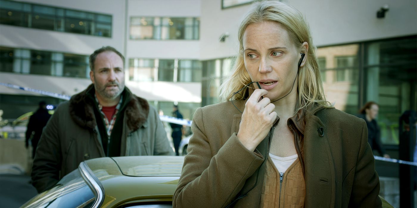 Woman on the phone with a man in the background