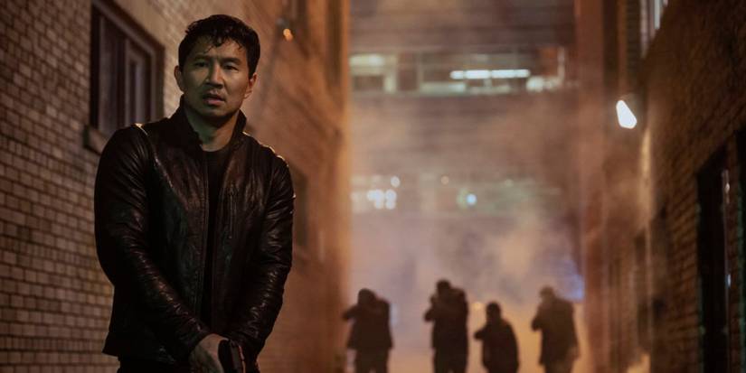 Simu Liu in an alley on 'The Copenhagen Test.'