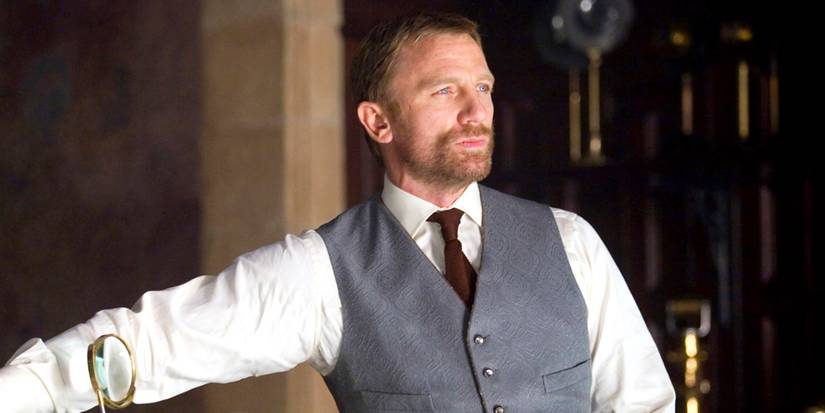 Daniel Craig with a beard and wearing a suit in The Golden Compass