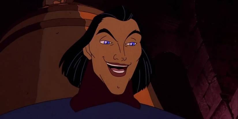 Sarousch smiling in front of a bell