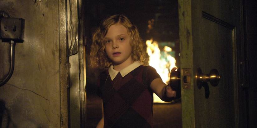 Elle Fanning opening a mysterious door in The Lost Room.