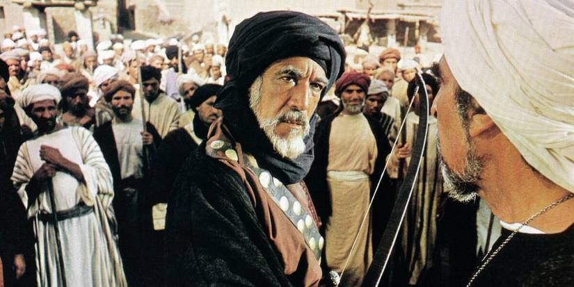 A man in front of a crowd addressing another man in The Message