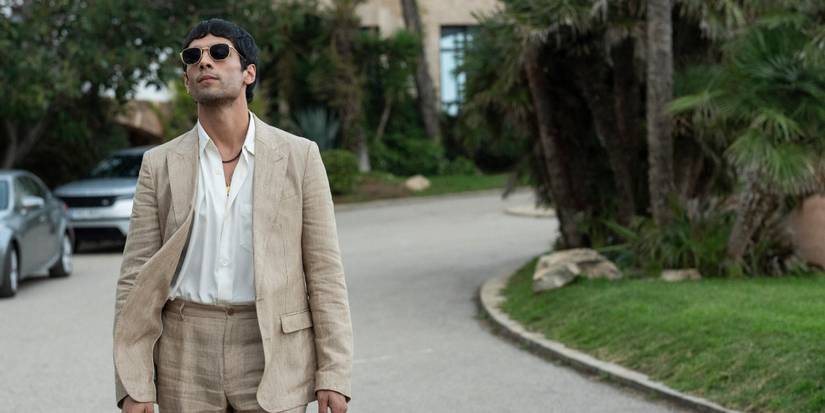 Teddy Dos Santos walking down a street in The Night Manager Season 2