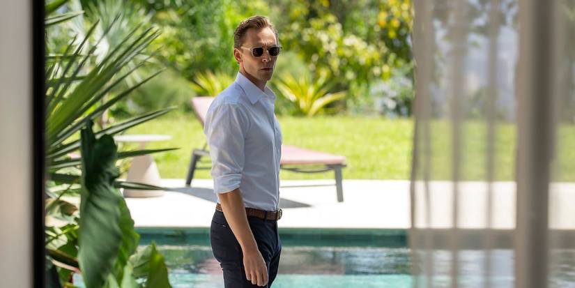 Jonathan Pine standing past an open window in The Night Manager Season 2