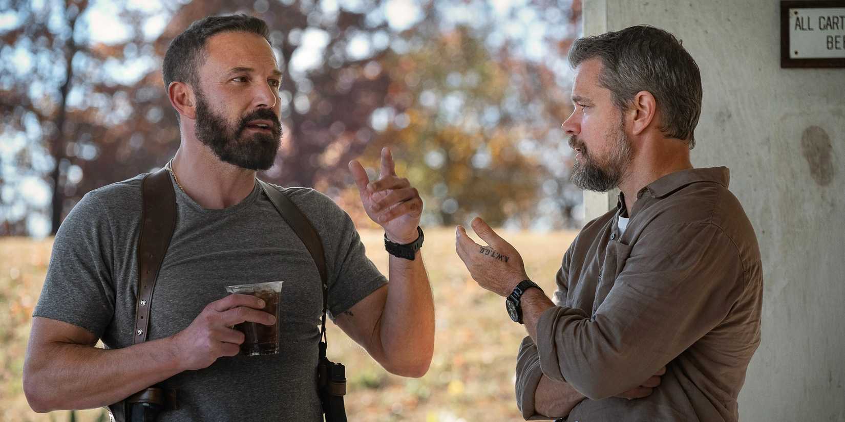 Ben Affleck and Matt Damon talking outside in The Rip