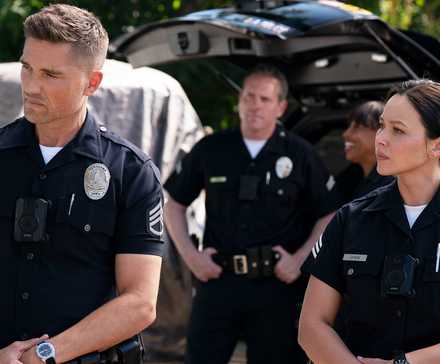 Eric Winter and Melissa O'Neil standing next to each other in The Rookie Season 8, Episode 2