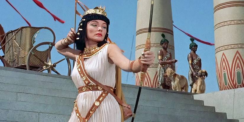 Bella Darvi as Nefer holding a bow in 'The Egyptian'