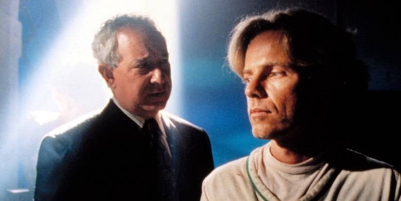 Bruce Greenwood and Michael Tucker in Nowhere Man