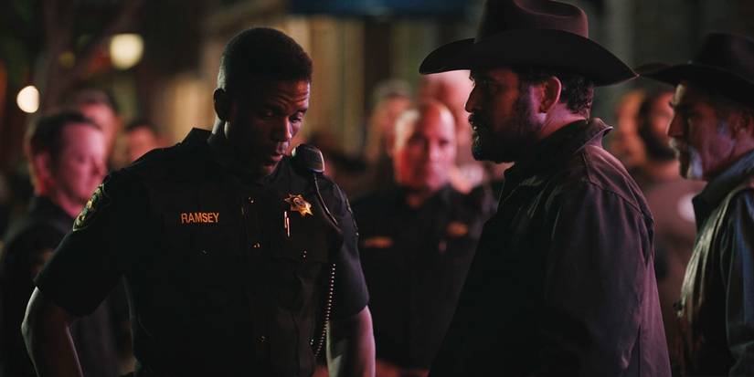 Sheriff Bill Ramsey (Rob Kirkland) threatens Rip Wheeler (Cole Hauser) in the 'Yellowstone' episode "Tall Drink of Water"