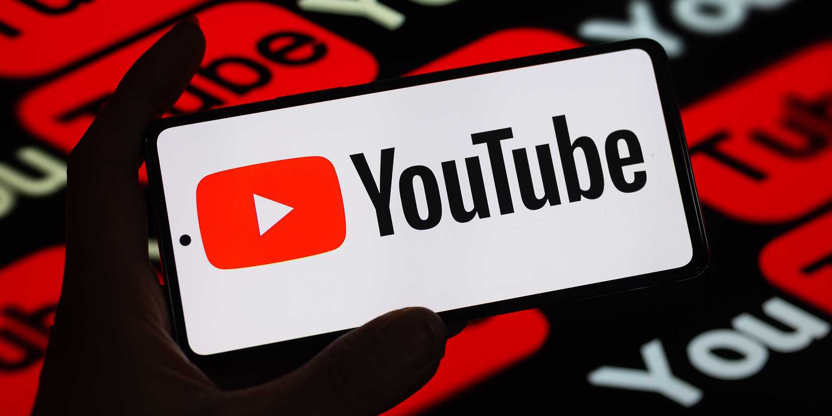 YouTube logo on a smartphone